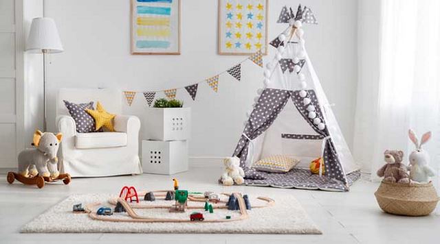 children's play room with lots of toys