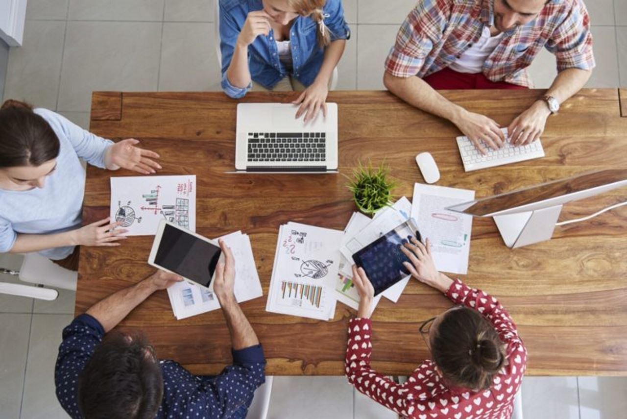 Topdown view of an employee team working together