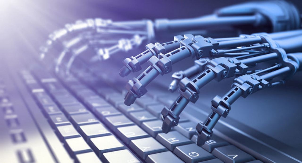 robot hands typing on computer keyboard
