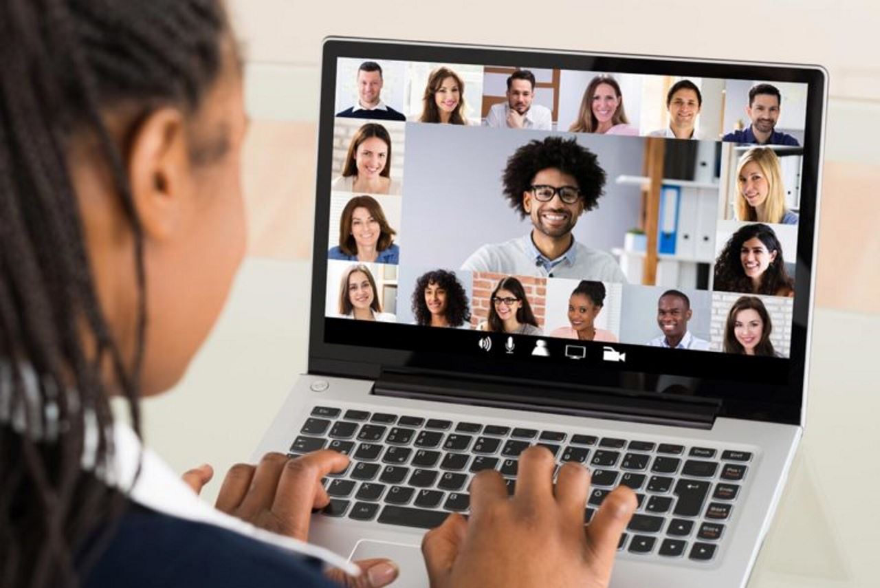 Female Accounts Receivable employee on Computer attending a Virtual Meeting