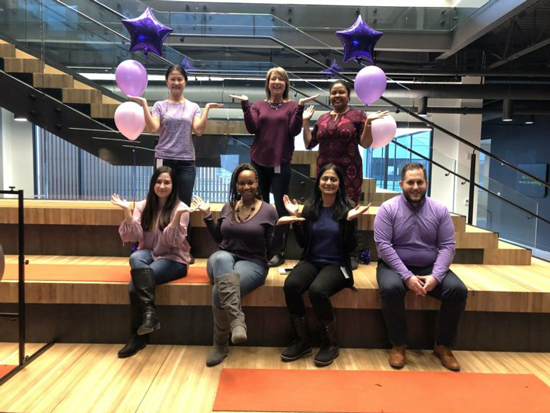 A group photo of the Women in Technology committee employee members