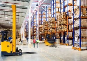 Building supply warehouse with forklift in foreground