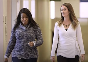 Professional Services Employees walking in hallway