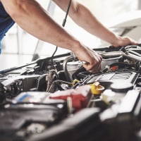 Mechanic working on automobile