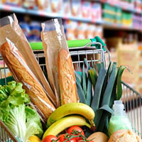 cart with food at grocery store