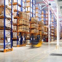 zoomed out image of a forklift in a warehouse