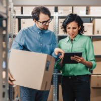 Future B2B eCommerce employees talking about online order in shipping room