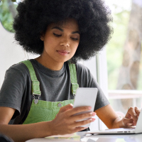 Gen Z Digital Payments girl on phone and laptop