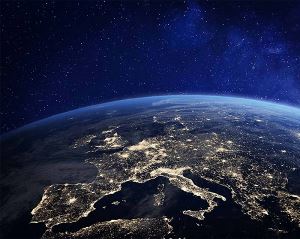 Earth from space at night, with cities lit up