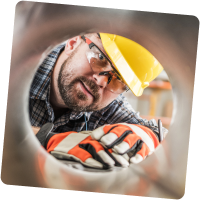 Plumbing HVAC Plumber Looking in pipe