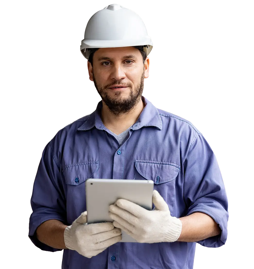 Electrician wearing a hardhat and gloves, holding a tablet