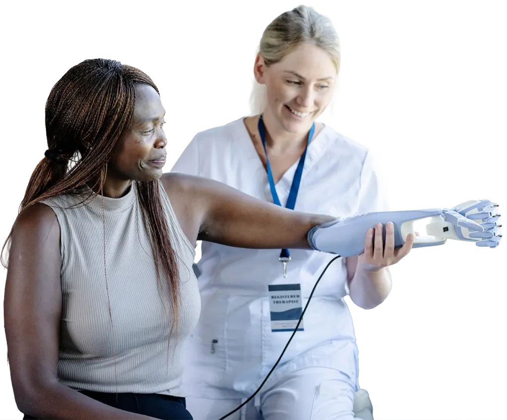 Physical therapist helping patient with new prosthetic arm