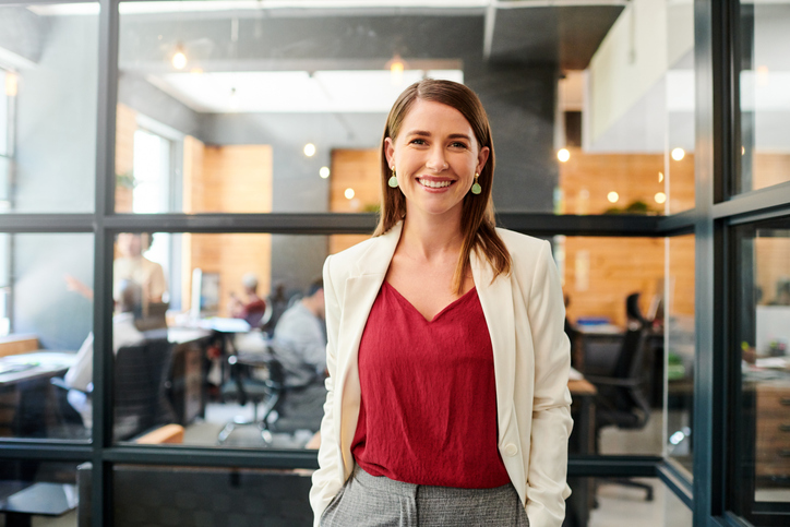 Portrait of a confident young businesswoman working in a modern office