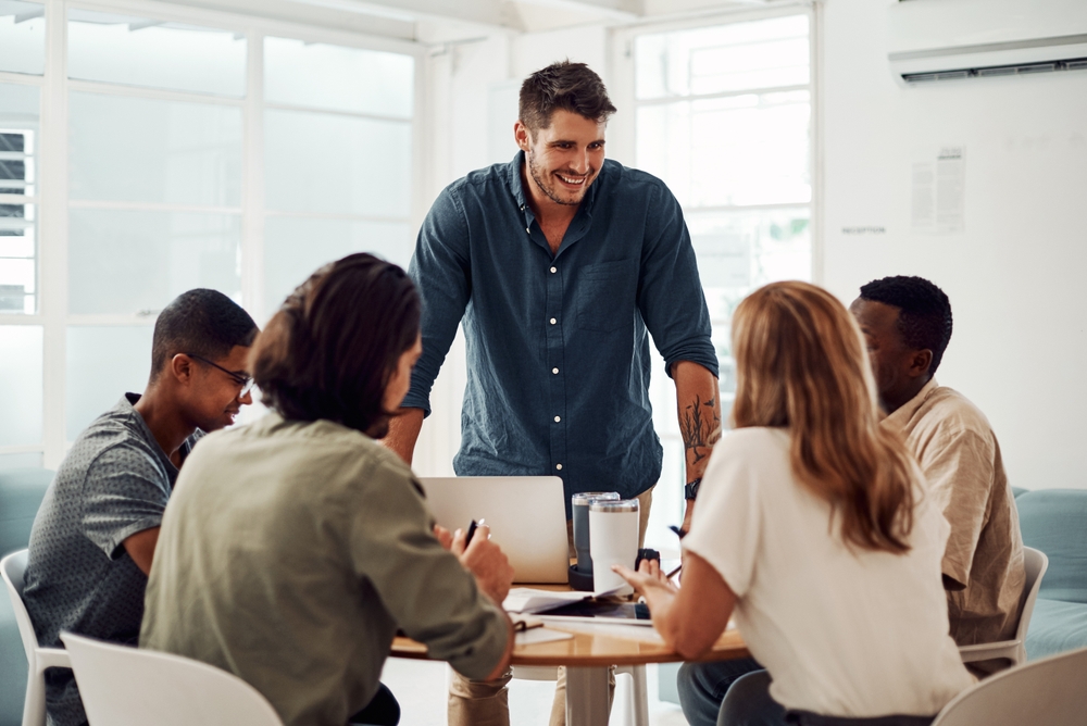 Manager leading a team meeting