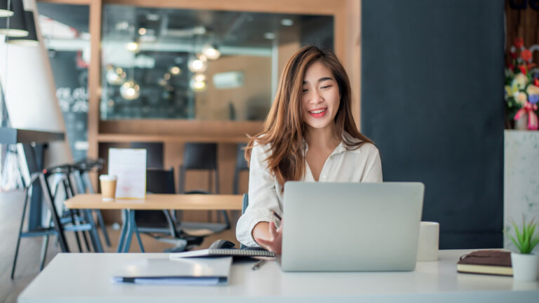 Young professional using laptop