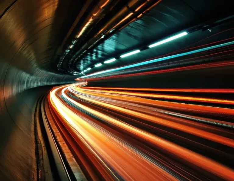 lights speeding through train tunnel