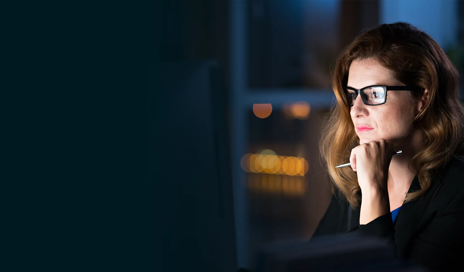 Woman looking at computer screen