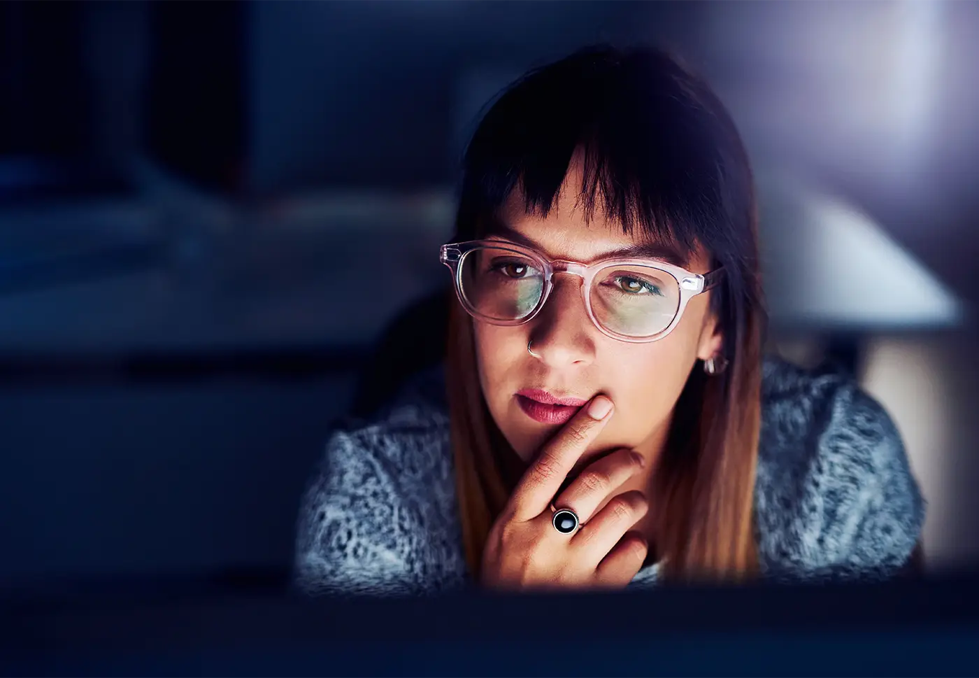 Woman working late in office