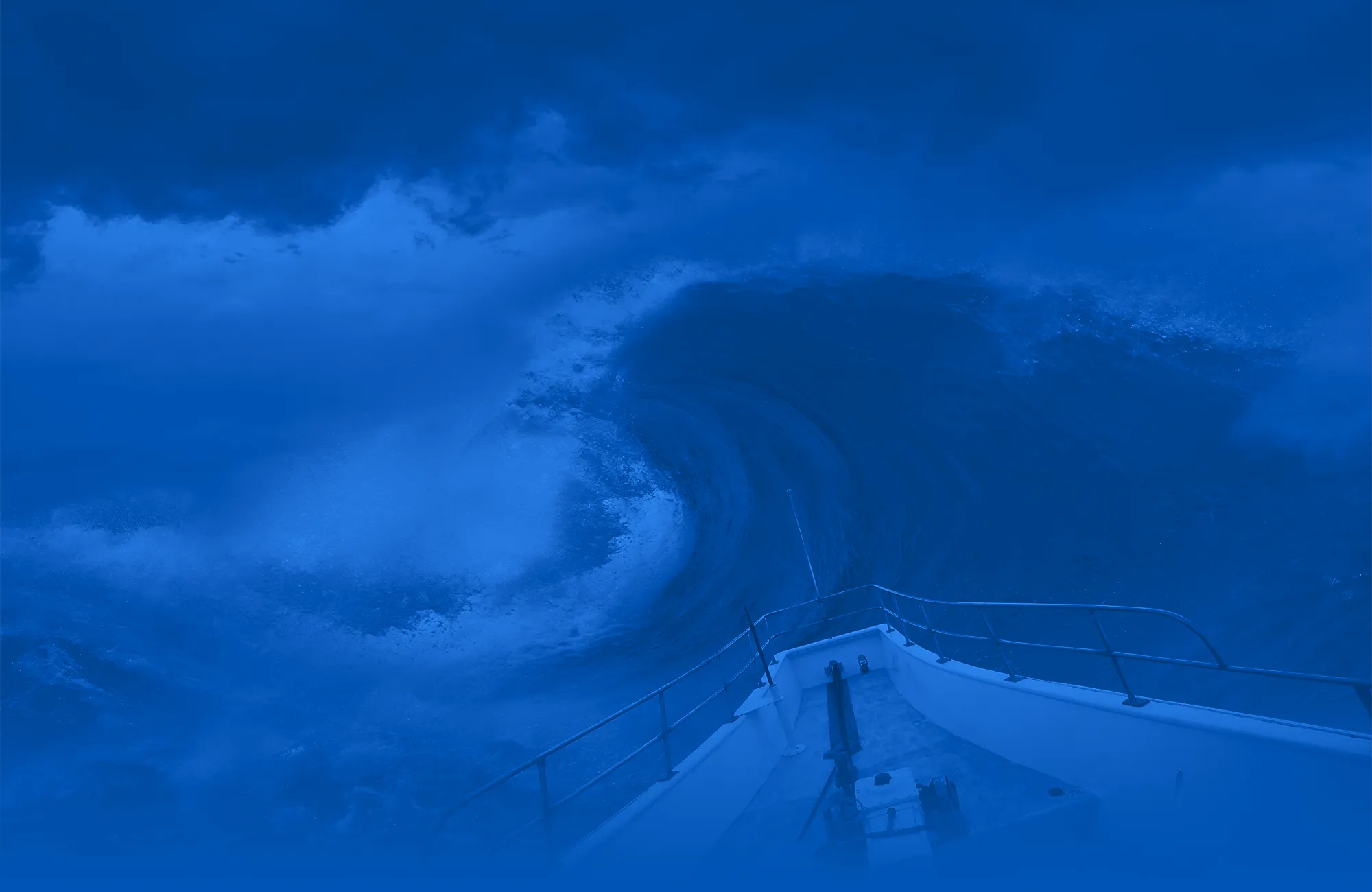 boat heading toward big wave