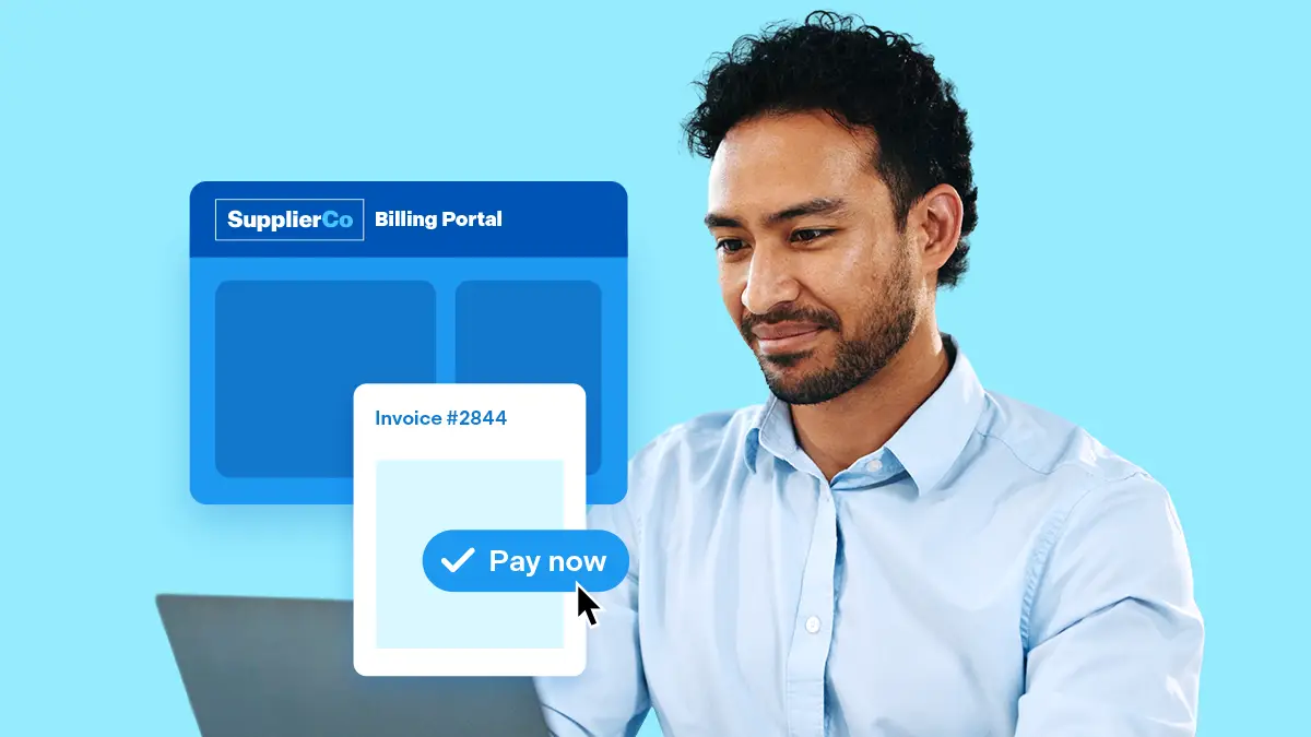 Man using laptop with SupplierCo Billing Portal displayed