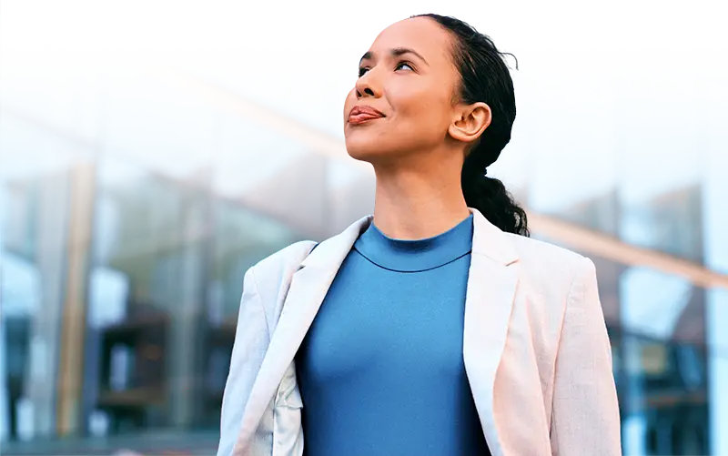 Businesswoman looking optimistic