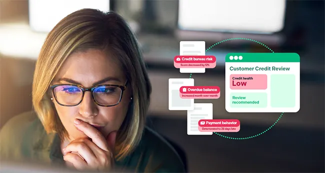 women wearing glasses looking at customer credit review screen