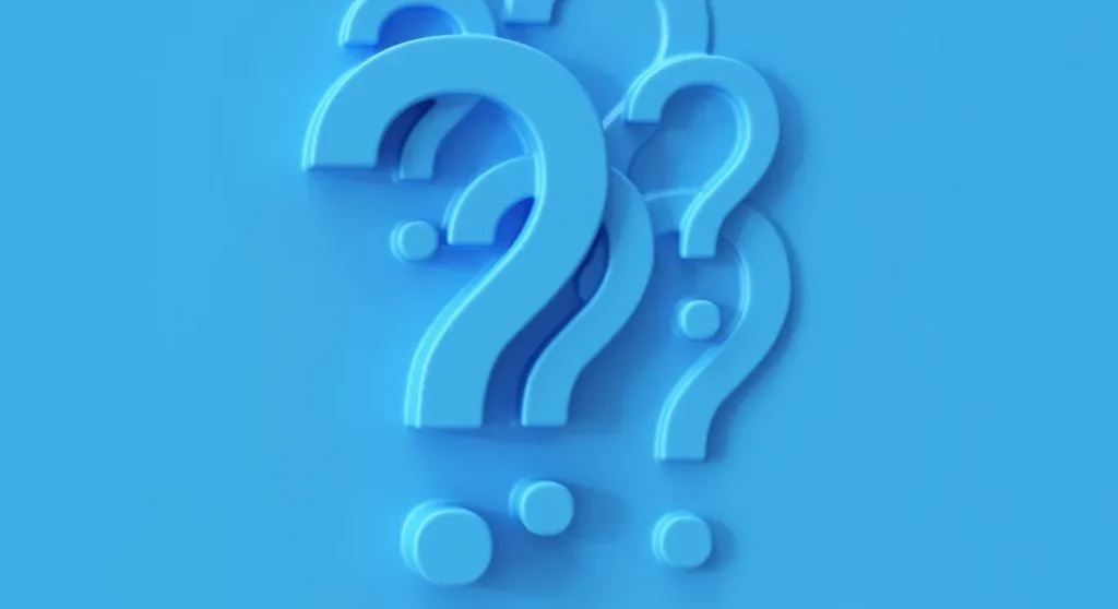 multiple question marks on a blue background