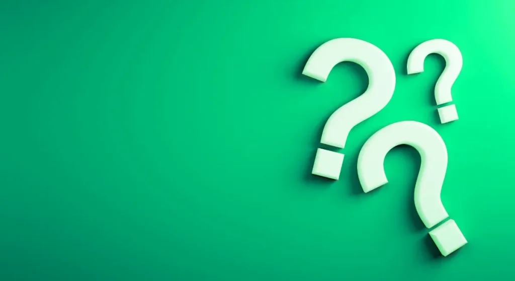 question marks on top of a green background