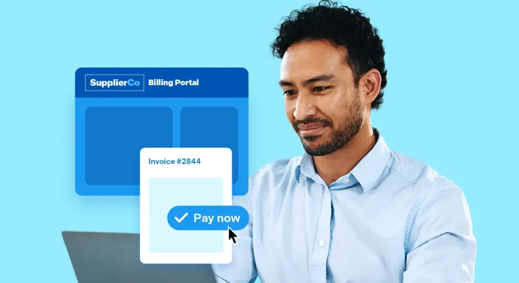 Man using laptop with SupplierCo Billing Portal displayed