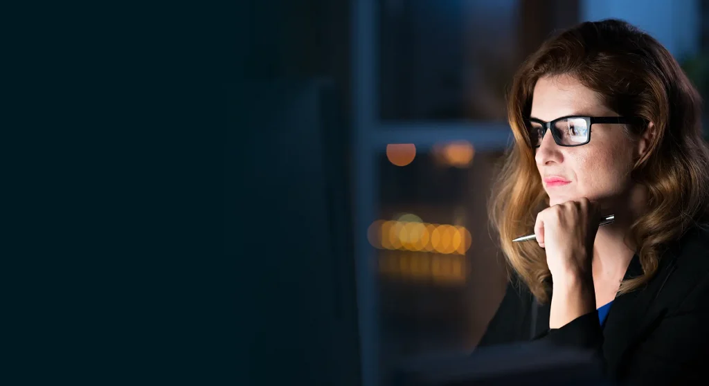 Woman looking at computer screen