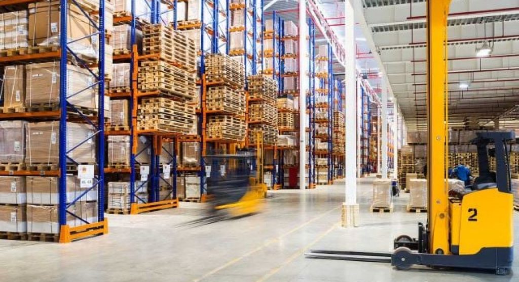 zoomed out image of a forklift in a warehouse