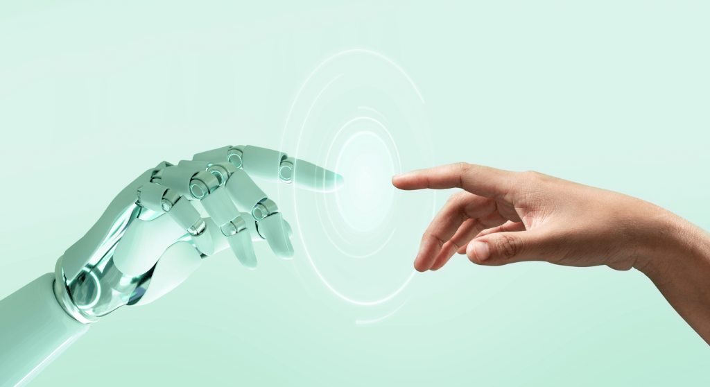 and image of a human hand and a robotics hand reaching out to touch at the index fingers