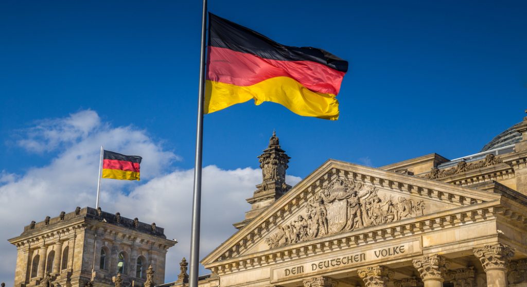 German flag flying over government building